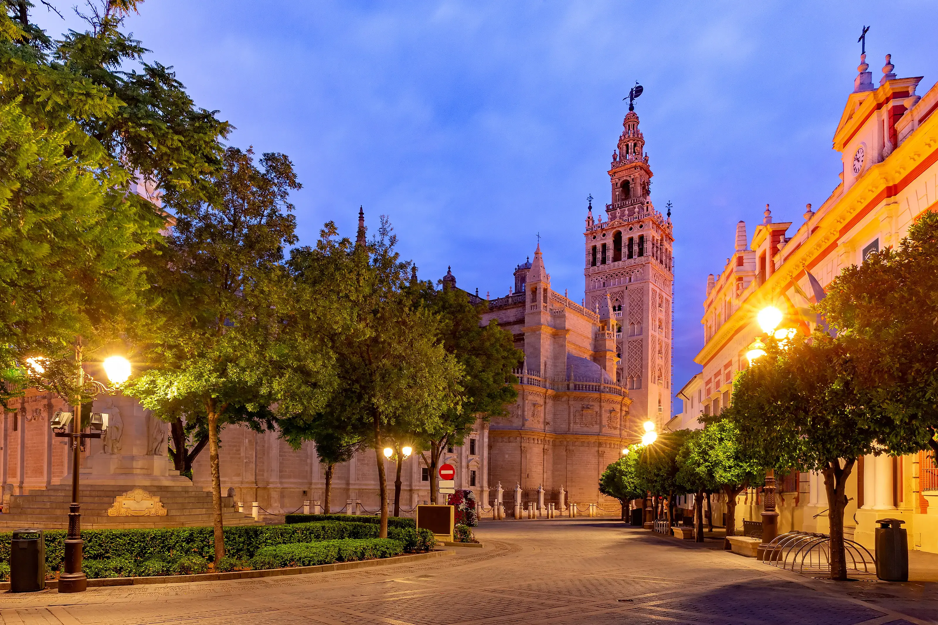  Comp Image Famous Bell Tower named Giralda and Cathedral Saint Mary of the See at night, Seville, Andalusia, Spain. Giralda and Seville Cathedral at night, Spain